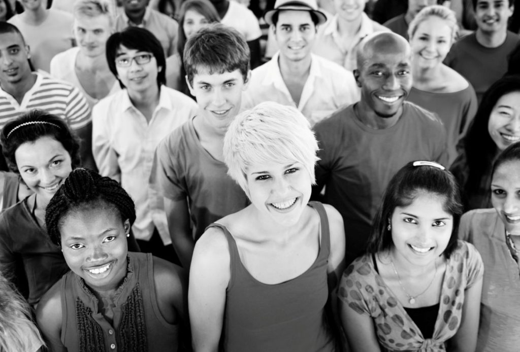 People smiling at a potential leader.